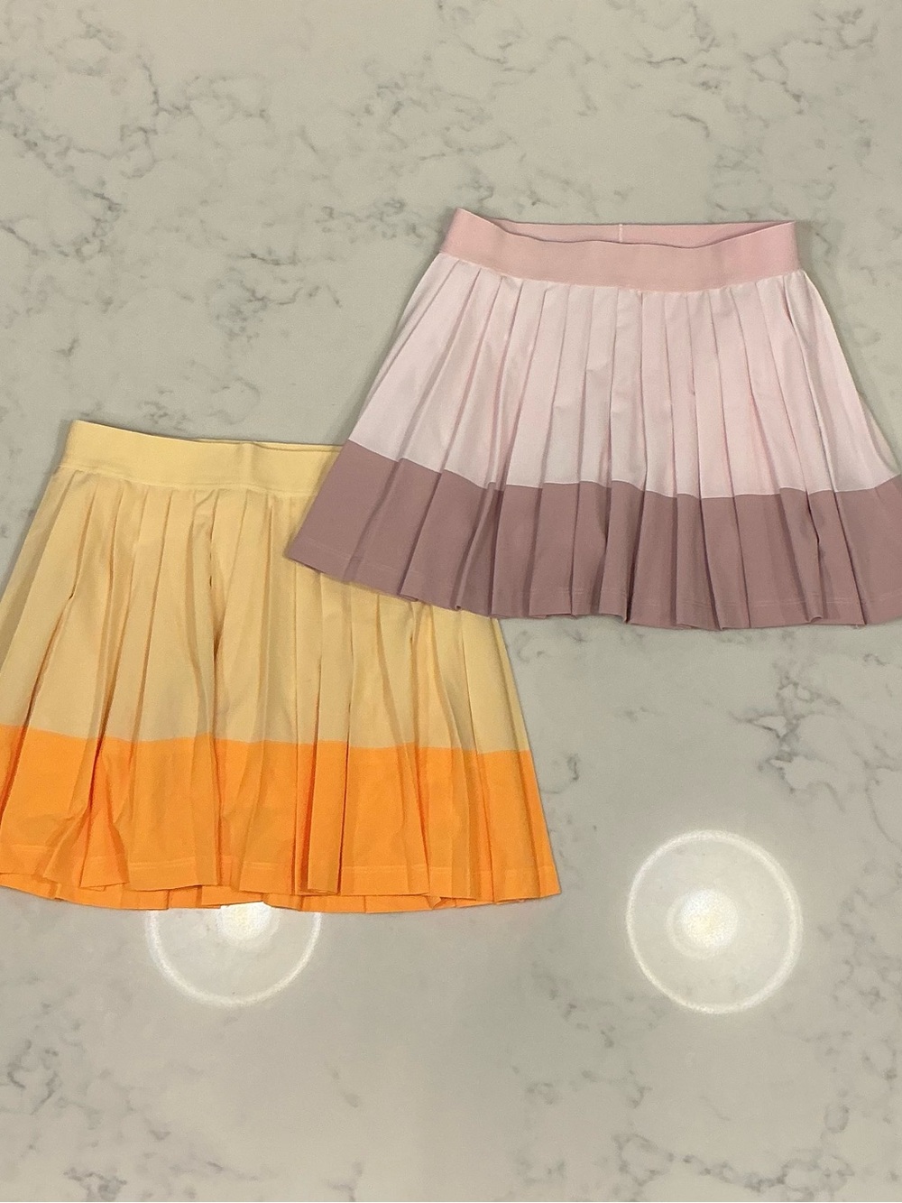 Athleta Girl Bundle of Two Skorts (Pink/Purple and Yellow/Orange)